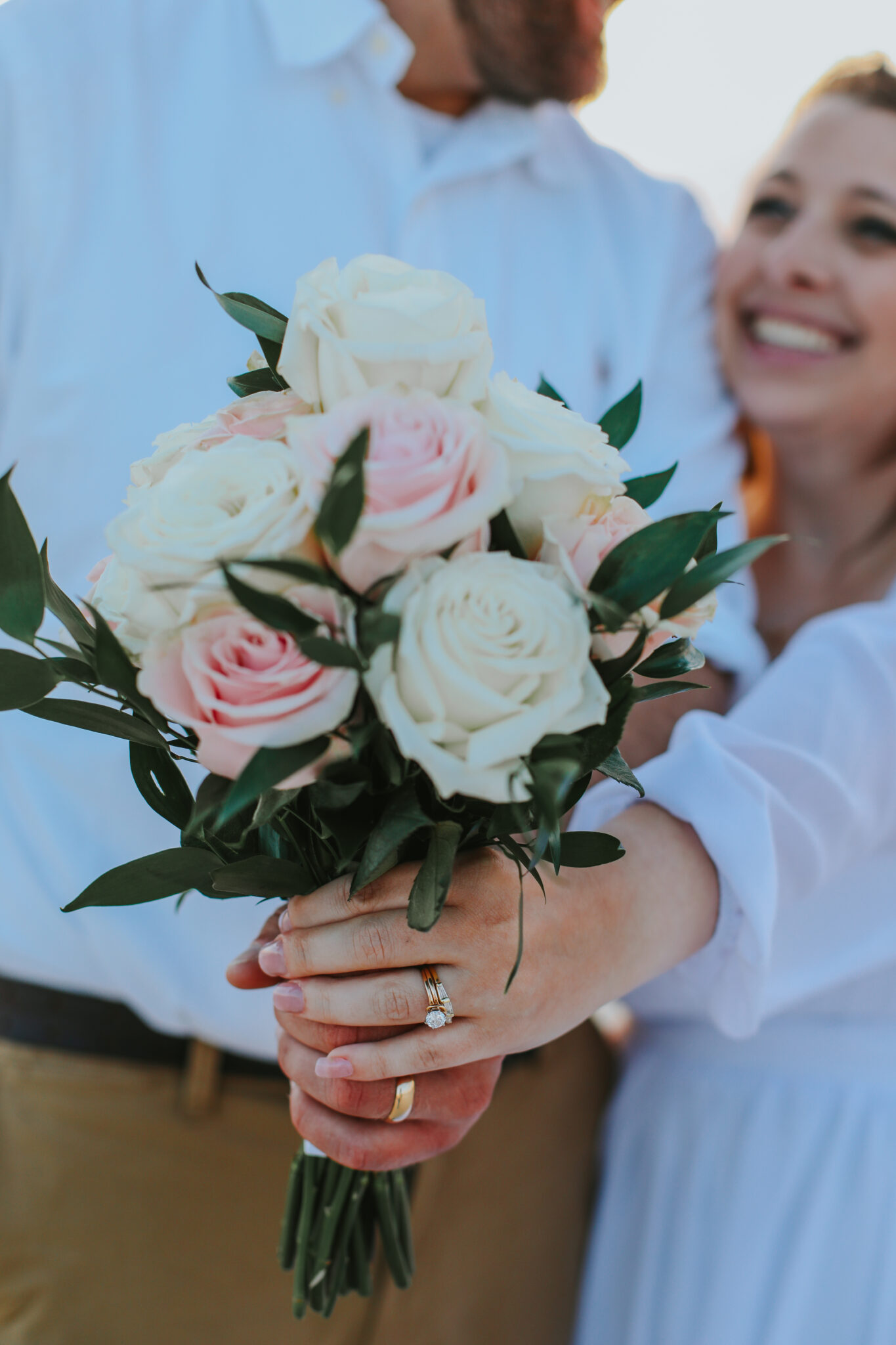 Couple holding their wedding bouquet